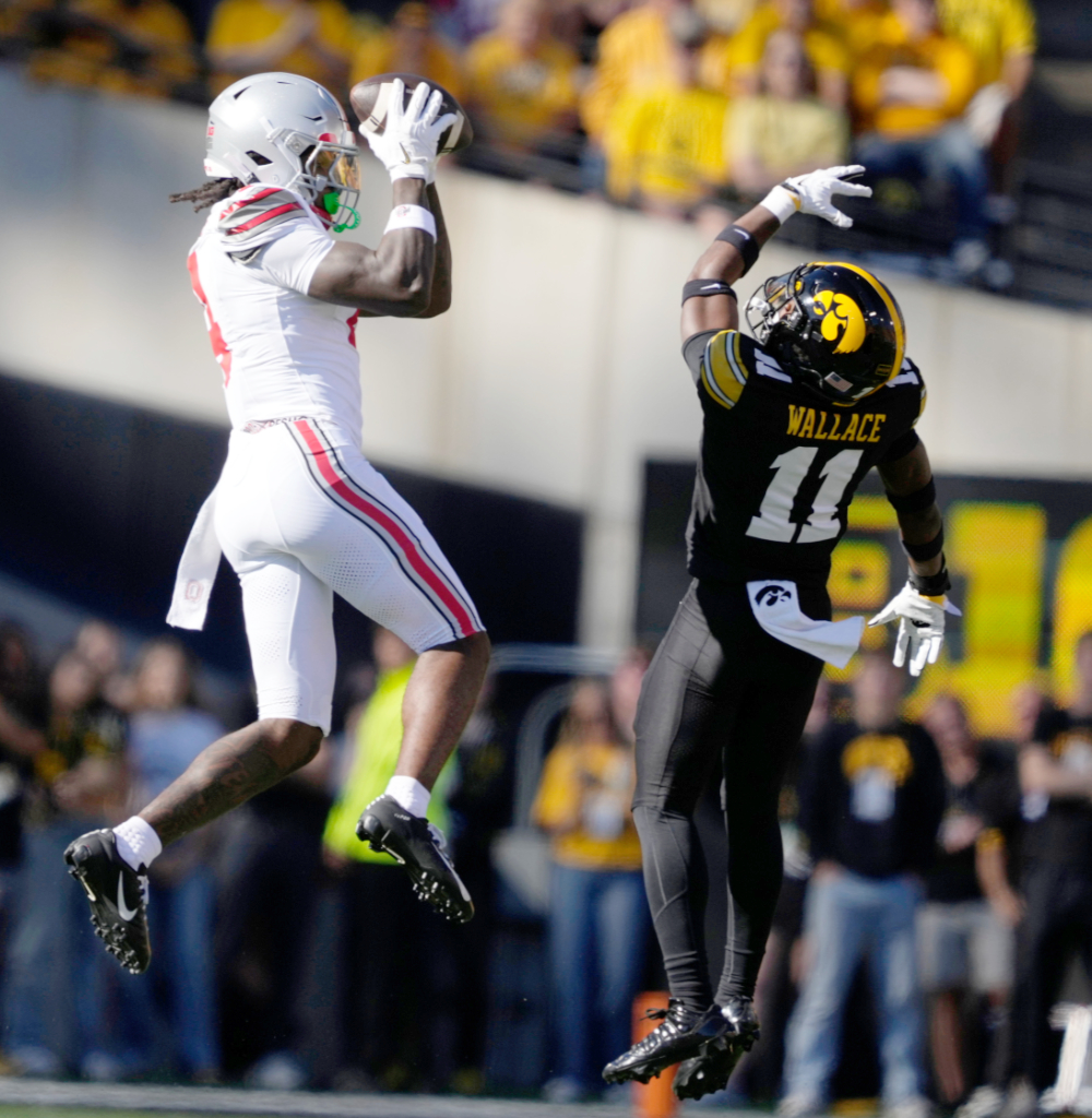 Julian Sayin and Jeremiah Smith Lead No. 5 Ohio State Past No. 14 Iowa 31-14